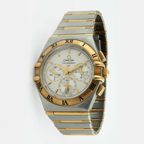 Reloj cronógrafo cab. suizo, OMEGA Constellation. Caja, 38 mm, y brazalete de acero y oro. Movimiento de cuarzo.