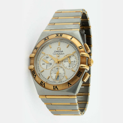 Reloj cronógrafo cab. suizo, OMEGA Constellation. Caja, 38 mm, y brazalete de acero y oro. Movimiento de cuarzo.
