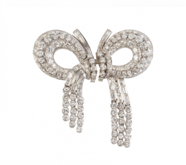 Elegante broche lazo doble clip a&ntilde;os 50, de brillantes y baguettes con cascadas de chatones de brillantes colgantes. 
