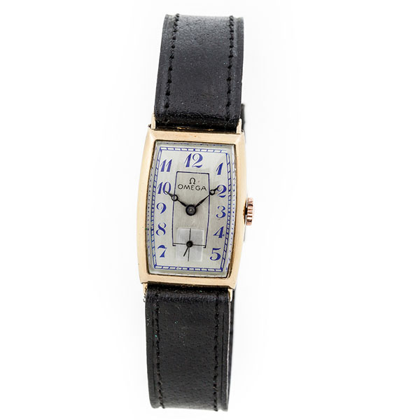 Reloj vintage, cab. suizo, OMEGA, en caja tipo 'tanque' rectangular-curvada de oro amarillo 18 K, 