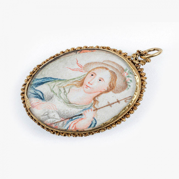 Medall&oacute;n pinjante devocional del siglo XVIII, en oro amarillo 18 K con miniaturas San Juan Bautista ni&ntilde;o y San Francisco de As&iacute;s