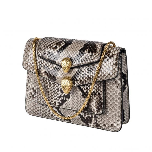 Bvulgari. Bolso bandolera Serpenti por Alexander Wang en piel de pitón de tonos grises. 