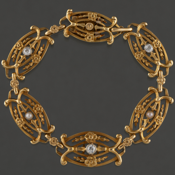 Pulsera modernista en oro amarillo de 18 kt con combinación de perlas y brillantes.