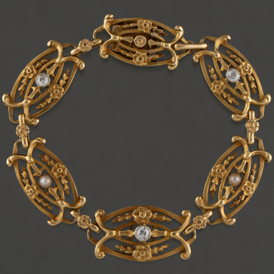 Pulsera modernista en oro amarillo de 18 kt con combinación de perlas y brillantes.