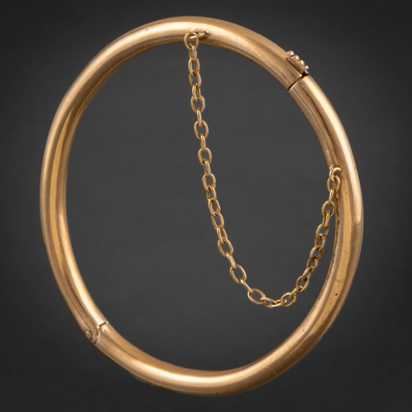 Pulsera de media ca&ntilde;a en oro amarillo de 18 kt.