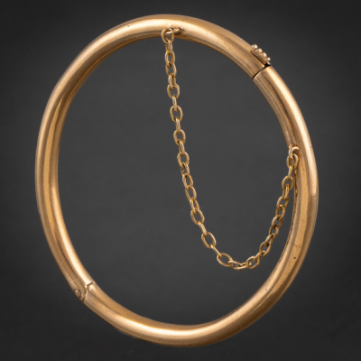 Pulsera de media ca&ntilde;a en oro amarillo de 18 kt.