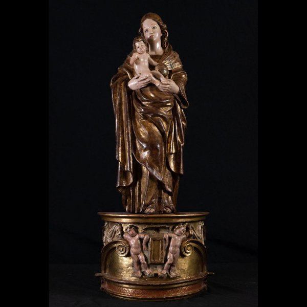 Espectacular Gran Virgen con Niño en brazos en madera de talla, escuela Romanista del siglo XVI.    