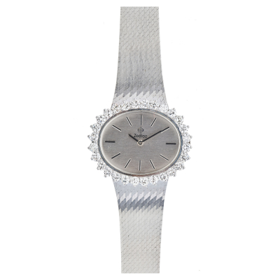Reloj Zodiac de pulsera para se&ntilde;ora. En oro blanco y bisel con diamantes talla brillante 