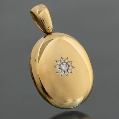 Colgante guardapelo en oro amarillo de 18kt.