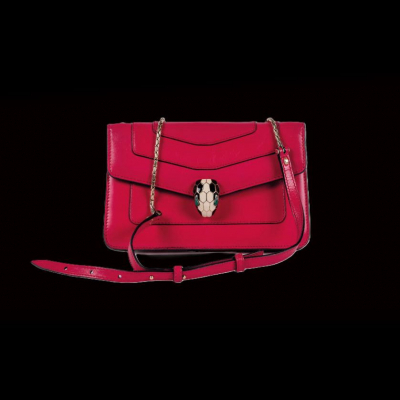 Bulgari. Bolso Serpenti, de hombro en cuero fucsia.