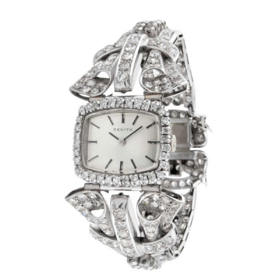 Reloj joya suizo ZENITH, en caja 25 x 20 mm y brazalete ancho de oro blanco 18 K cuajado de limpios y blancos diamantes, talla brillante antigua y diamantes 8/8