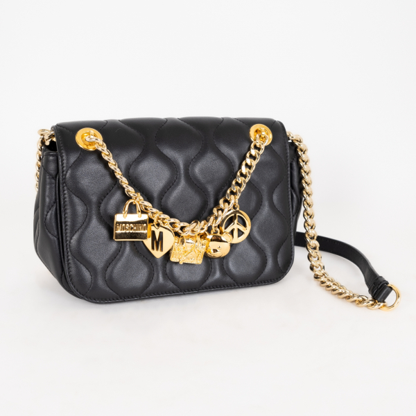 MOSCHINO Couture. Bolso de tipo «corssbody» en cuero de tonalidad negra con pespunte acolchado.  