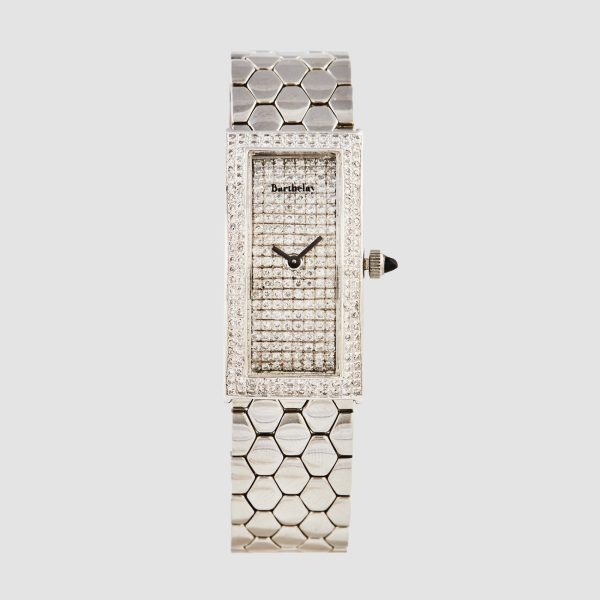 BARTHELAY. Reloj de pulsera para señora. En acero. Esfera y bisel cuajados de diamantes talla brillante. 