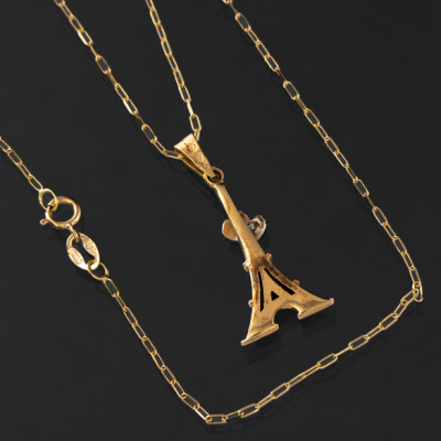 Cadena en oro amarillo de 18kt con colgante de la torre Eiffel.
