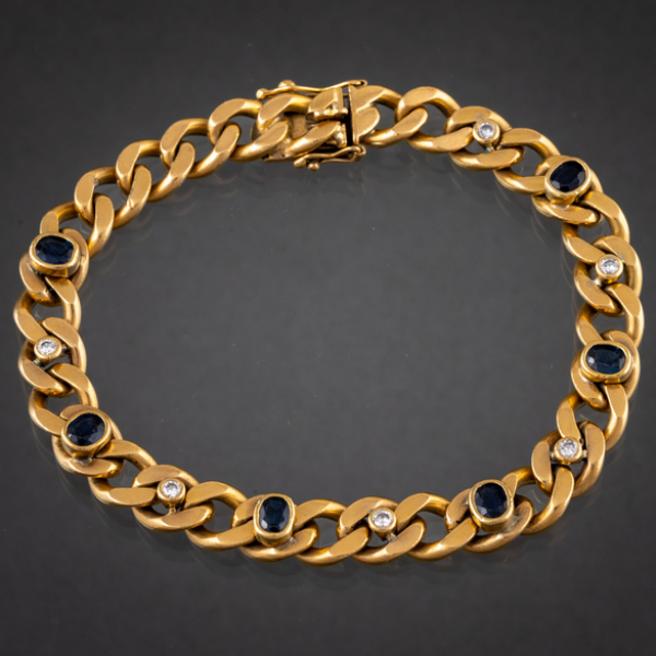 Pulsera de calabrote en oro amarillo de 18 kt con zafiros y brillantes alternados.