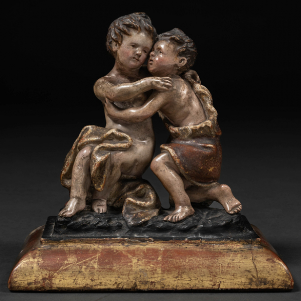 "San Juan y el niño Jesús" Grupo escultórico en madera tallada y dorada. Trabajo Colonial del siglo XVIII