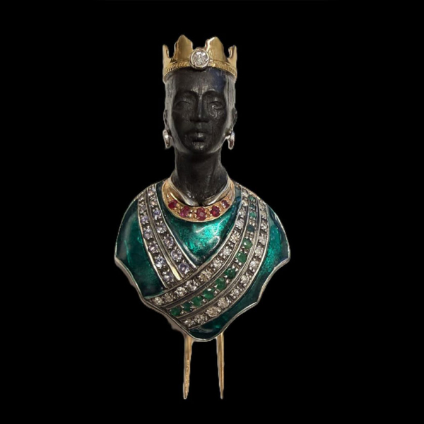 Broche moretto con esmalte y diamantes.  En oro amarillo de 14 K