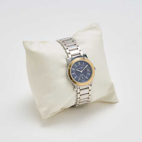 GIRARD PERREGAUX. Reloj de pulsera unisex. En acero y oro. Esfera azul con numeración arábiga.