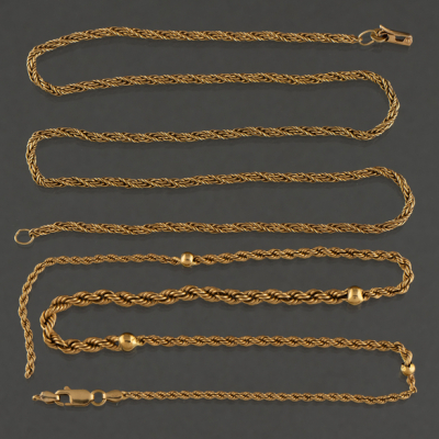 Conjunto de dos cadenas sogueadas en oro amarillo de 18 kt.