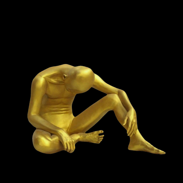 Aung KO (1980) &quot;Autorretrato&quot;.    Escultura de resina dorada.