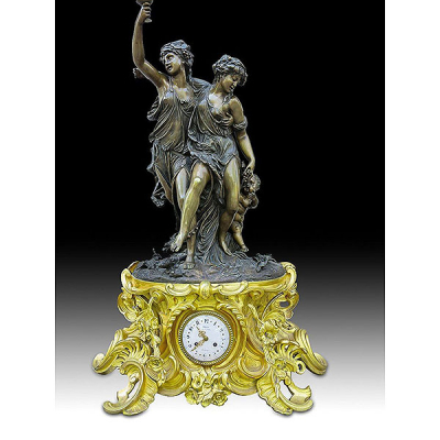 Gran Reloj Péndulo Clodion, siglo XIX. Bronce dorado y pavonado. Excelente calidad.