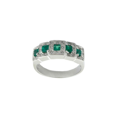 Anillo en sólida montura de oro blanco con banda en pavé de bonitas esmeraldas 