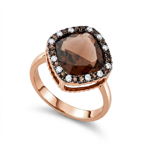 Sortija en oro rosa con topacio central y orla de diamantes talla brillante y diamantes brown con un peso total de 0,15 cts. aprox.