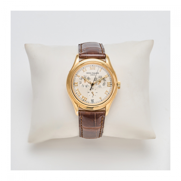 PATEK PHILIPPE. Reloj de pulsera para caballero. En oro y correa de piel con hebilla ardillón, c.1995. Ref. 5035J-001.