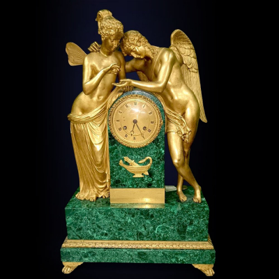 François Linke (1855–1946) para Leroy et Fils- Monumental Reloj de Mesa en Bronce y Malaquita del siglo XIX.   Firmado. Representando a Eros y Psique.