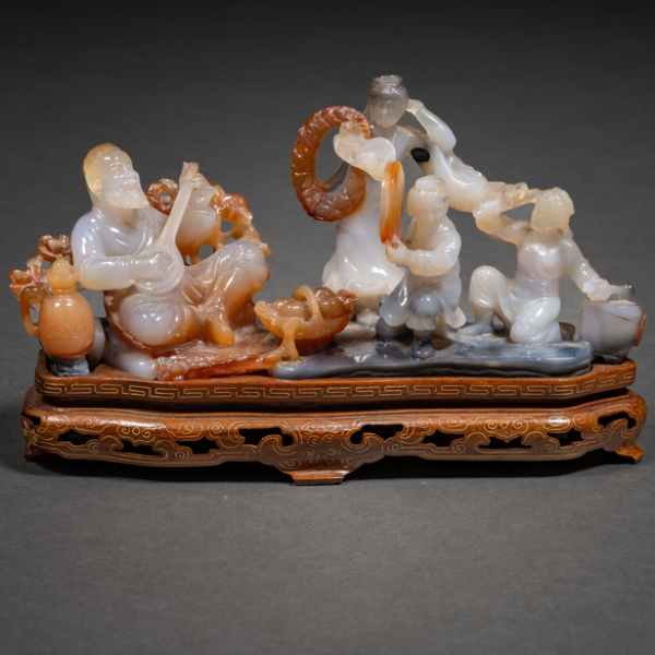 "Conjunto de músicos" Grupo escultórico tallado en ágata de varios colores del siglo XX.