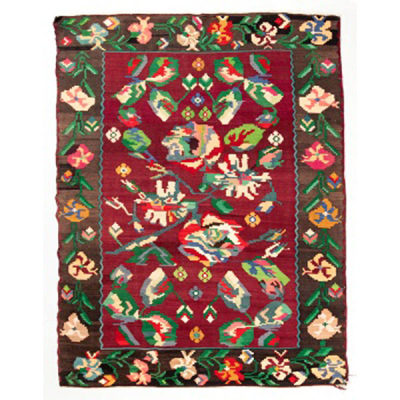 Alfombra Kilim de lana con decoración vegetal y flores en tonos verdes, rosas, azules, etc.  Época: S. XX