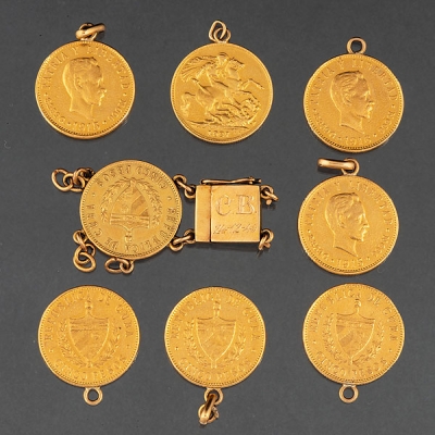 Conjunto de 8 monedas en oro amarillo de 18 kt. 