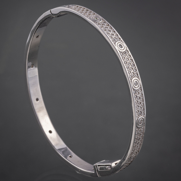 Pulsera rígida en plata de ley estilo Cartier con circonitas.