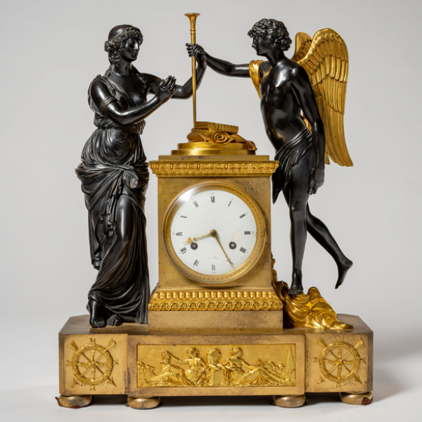 Reloj franc&eacute;s Imperio de sobremesa en bronce dorado y bronce pavonado del siglo XIX