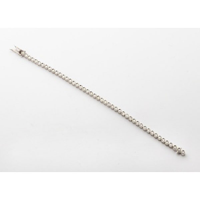 Pulsera riviere en oro blanco con 46 diamantes talla brillante