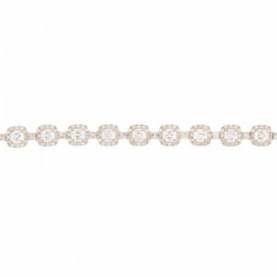 Pulsera en oro blanco diseño rosetones con centro y entrepiezas de diamantes talla princesa