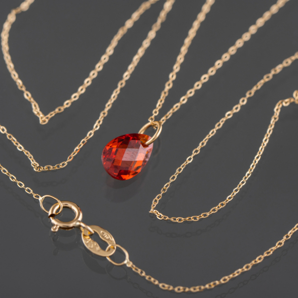 Cadena en oro amarillo de 18 kt con topacio 