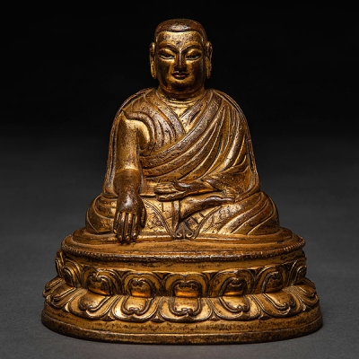 Buda tibetano en bronce dorado