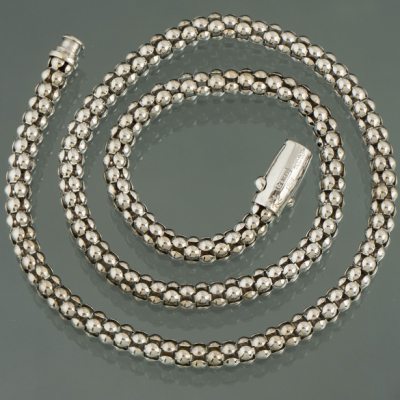 Gargantilla de bolas en oro blanco de 18kt.
