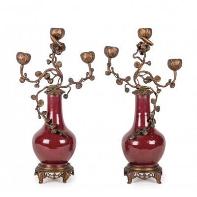 EDOUARD ENOT (S. XIX - PP. S. XX) Pareja de jarrones orientales en porcelana esmaltada rojo sangre de toro y vidriada.