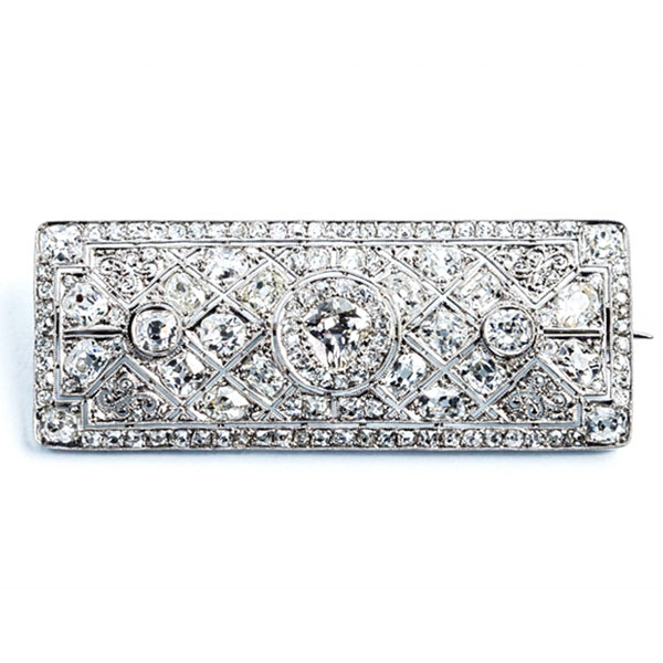 Espléndido broche antiguo, 'art-decó', en montura rectangular calada de platino y diamantes