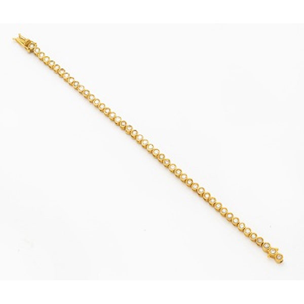 Pulsera riviere en oro amarillo con 46 diamantes talla brillante