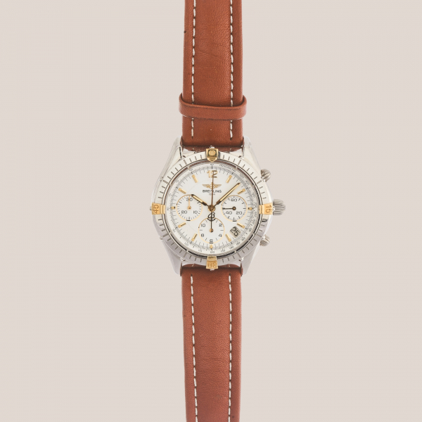 BREITLING &laquo;Cronomat GMT&raquo;. Reloj de pulsera unisex. En acero y oro con correa de piel. Reedici&oacute;n 1990.