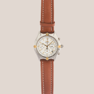 BREITLING &laquo;Cronomat GMT&raquo;. Reloj de pulsera unisex. En acero y oro con correa de piel. Reedici&oacute;n 1990.