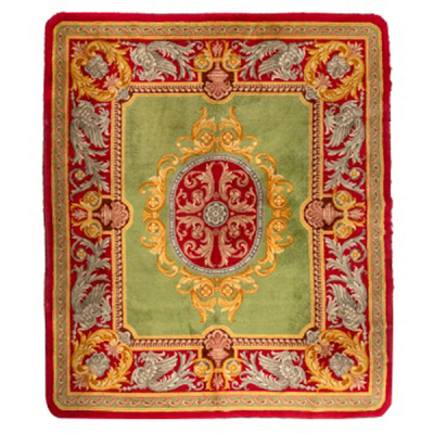 Alfombra de lana de nudo espa&ntilde;ol con decoraci&oacute;n vegetal, medall&oacute;n central, guirnaldas y greca S. XX