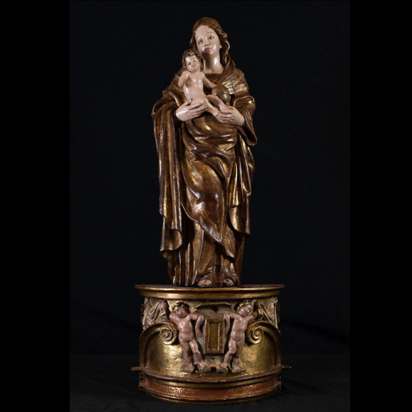 Espectacular "Virgen con Ni&ntilde;o en brazos" en madera de talla, escuela Romanista del siglo XVI.