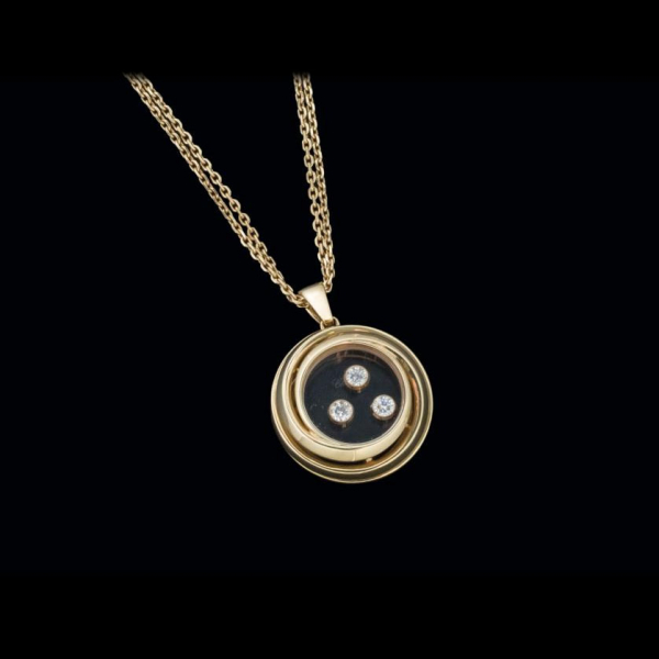 Colgante Chopard Happy Diamonds de oro rosa 18K.