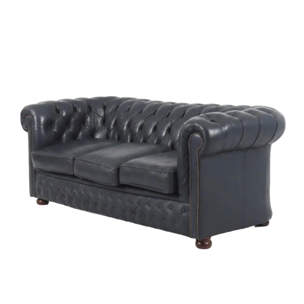 Sof&aacute; Chesterfield de tres plazas de la manufactura Winchester en piel de tonalidad azul marino, fles. del s.XX.