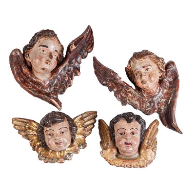 Cuatro cabezas de ángeles de madera tallada y policromada, S.XVIII